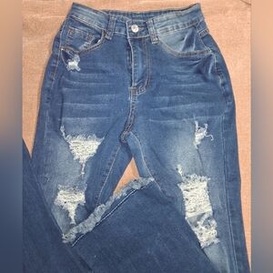 Women's Distressed Blue Jeans